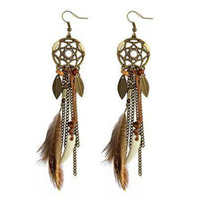 Charger l'image dans la galerie, Boucles d'oreilles plumes d'Amérique - image 1