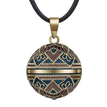 Cargar imagen en el visor de la galería, Pendentif fait d'une boule d'harmonie - image 1