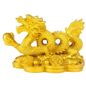 Statue du dragon d'or tenant un globe - image 2