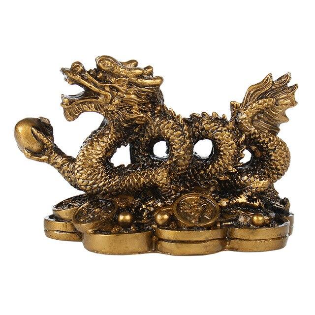 Statue du dragon d'or tenant un globe - image 1