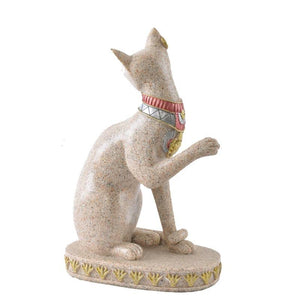 Statuette égyptienne de chat qui tourne la tête 